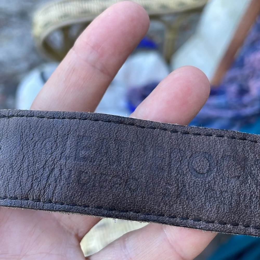 Leatherock bronze, and silver alligator or snake statement, leather belt